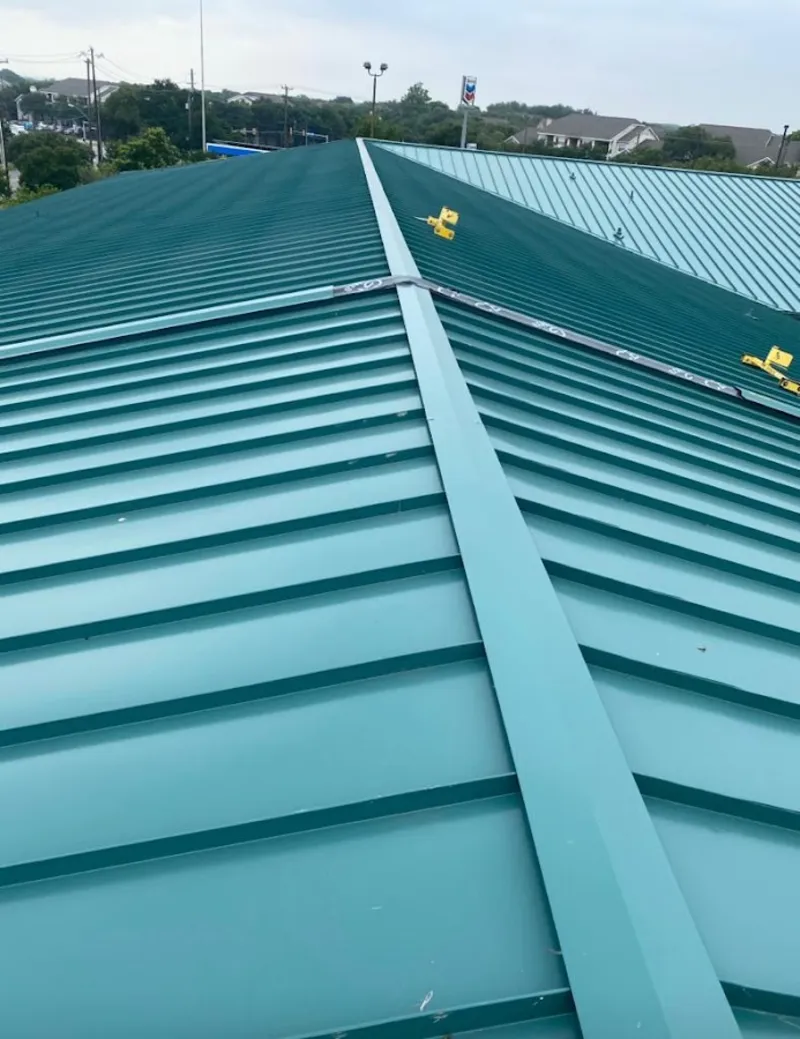 Green commercial metal roof ridge and valley for Metal Roof Repair in Discovery Bay